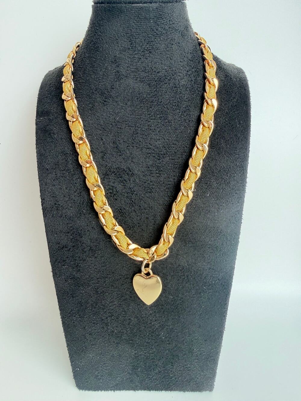 Vintage chain necklace interwoven with fabric and a heart charm retro fashion